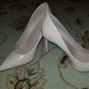 Tan high heel pumps